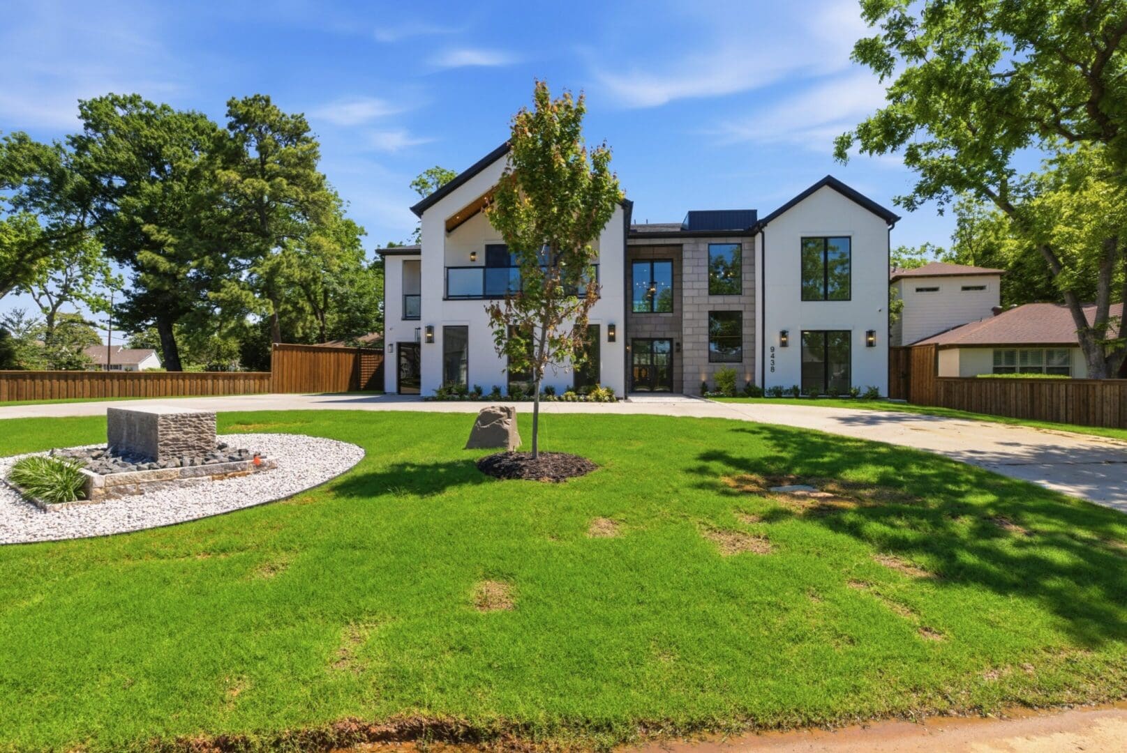 Modern two-story house with manicured lawn